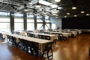 tables and chairs set up in theater