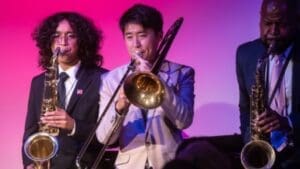 teenager kids playing trumpets